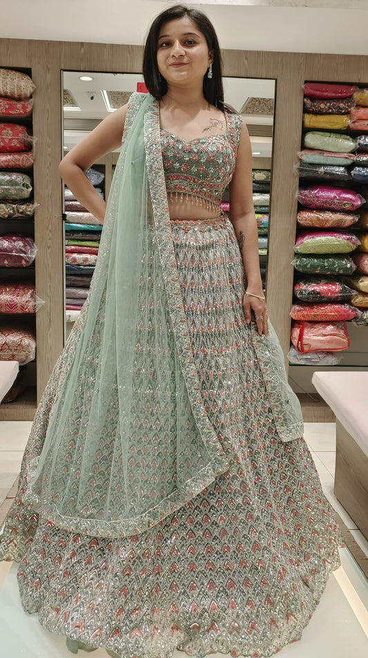 Light Pista Color Net Sequins Work Lehenga Choli