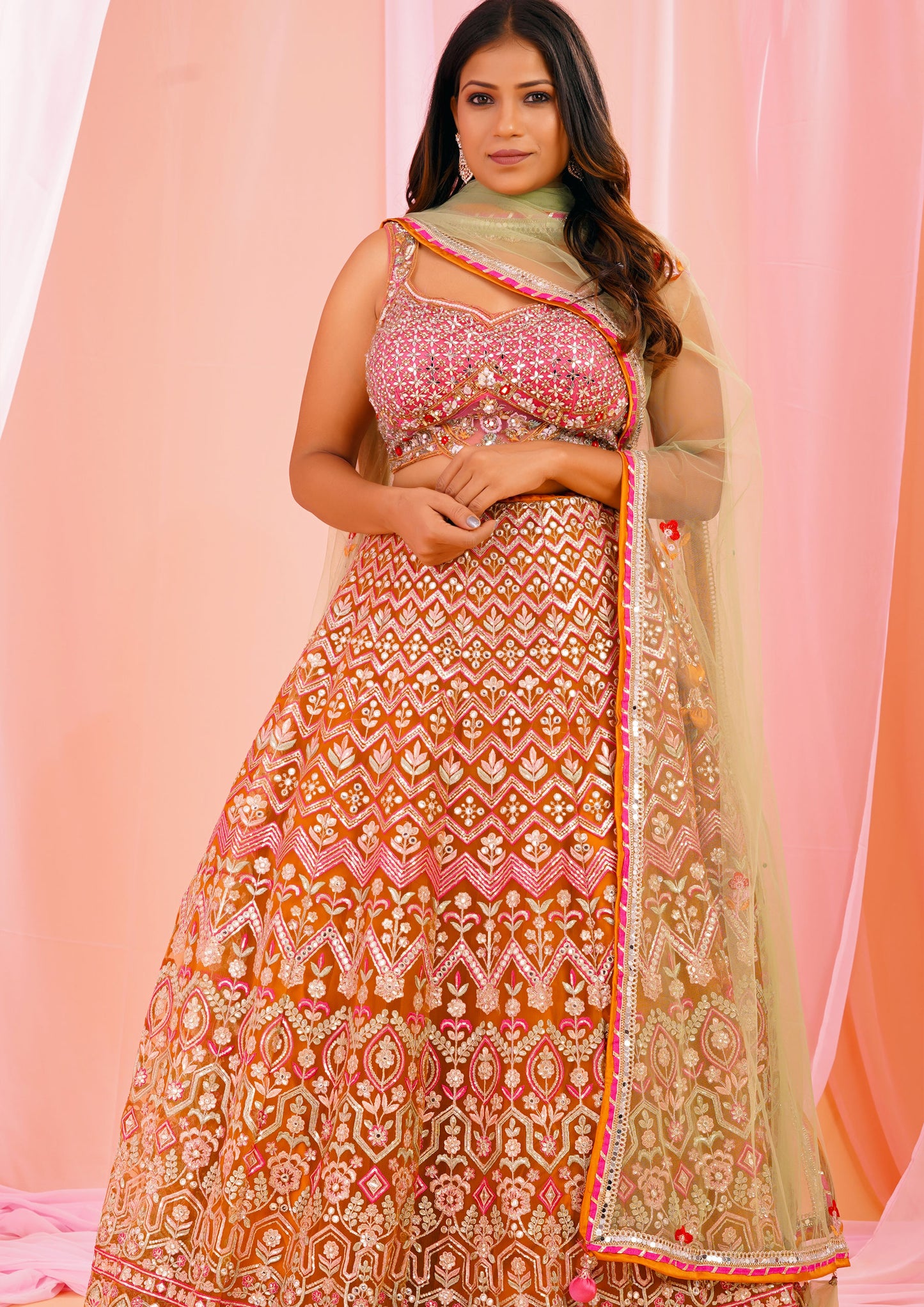 Mustard And Pink Color Net Wedding Wear Lehenga Choli