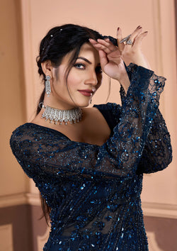 Stunning navy blue satin gown featuring delicate embroidery, ideal for special occasions.