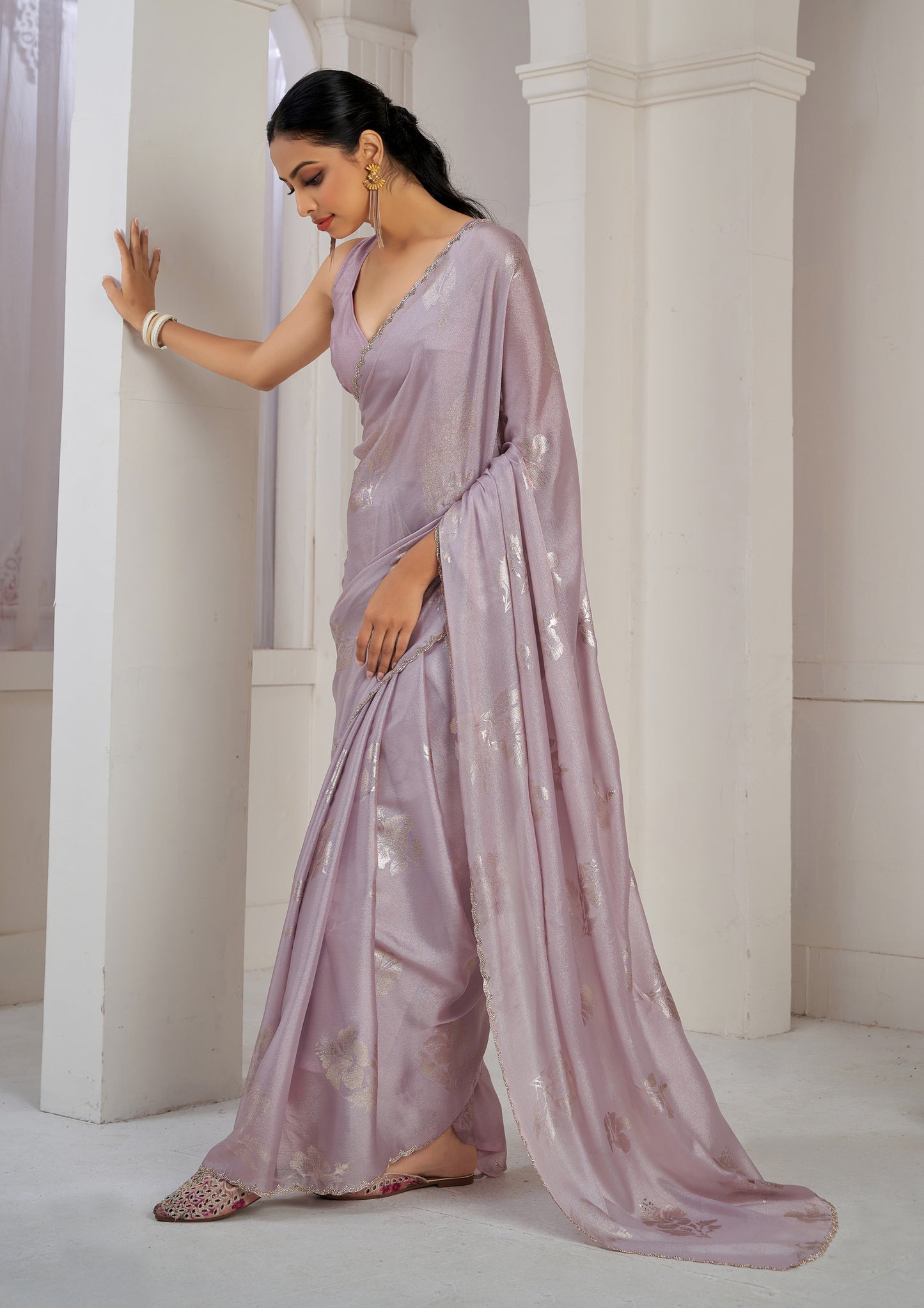 Lavender Color Chinnon Silk Heavy Zircon Border With Foil Print Saree