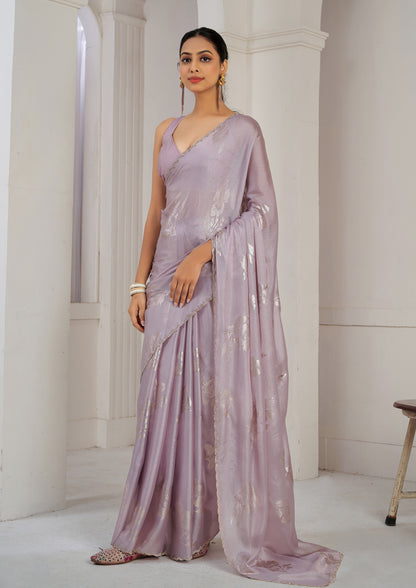 Lavender Color Chinnon Silk Heavy Zircon Border With Foil Print Saree