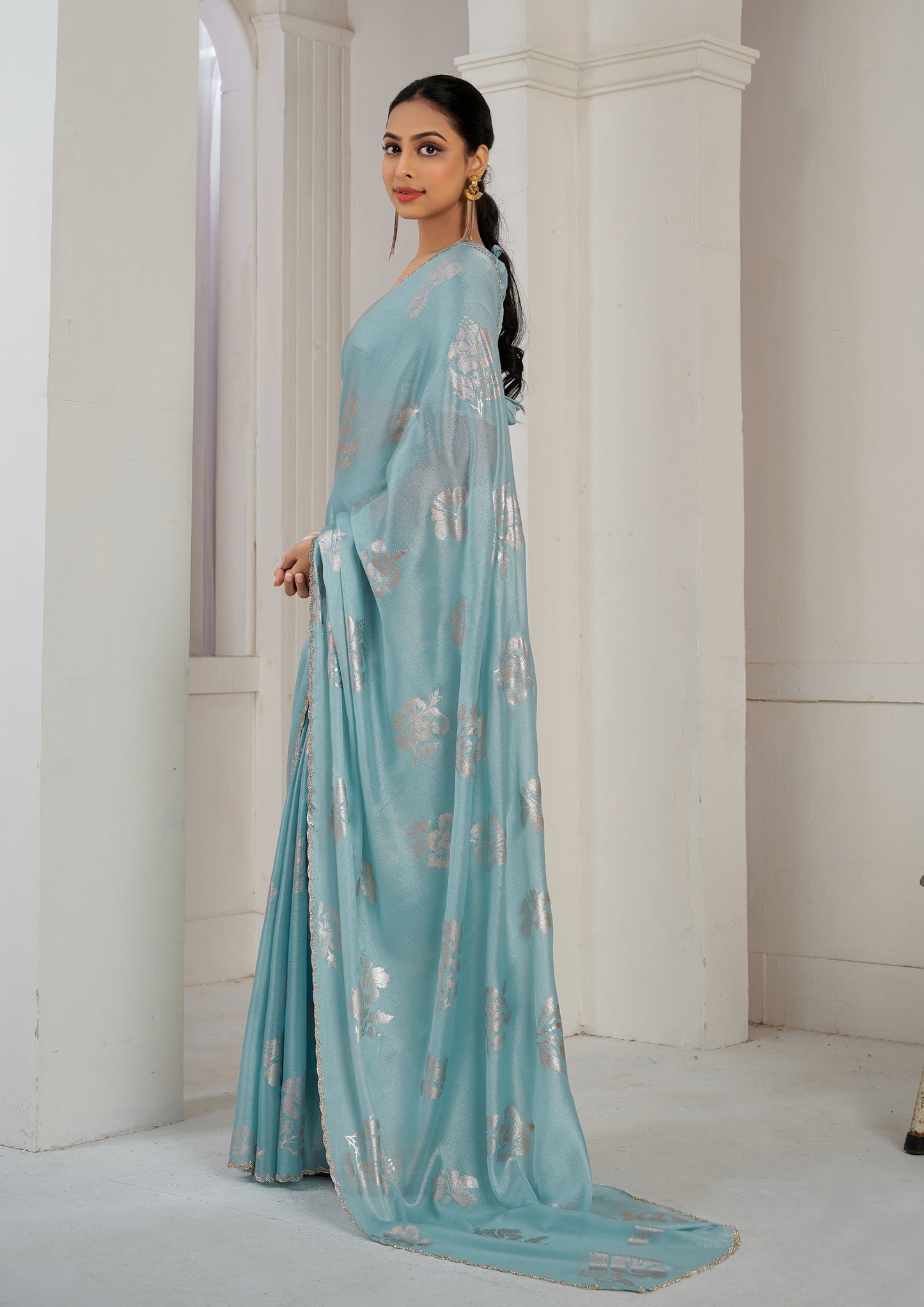 Sky Blue Color Chinnon Silk Heavy Zircon Border With Foil Print Saree