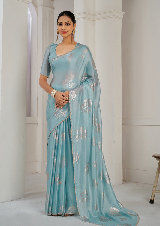 Sky Blue Color Chinnon Silk Heavy Zircon Border With Foil Print Saree