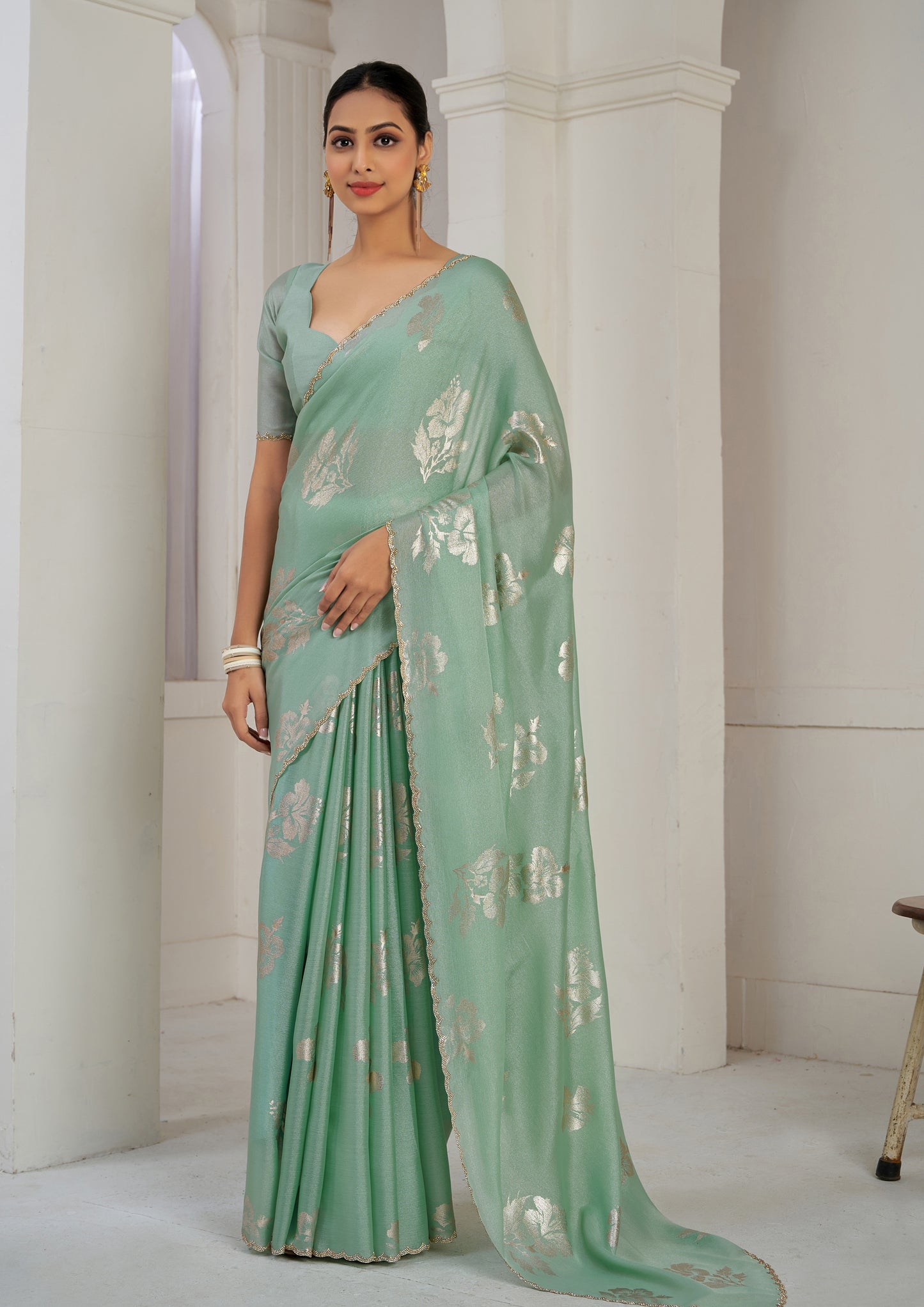 Pista Green Color Chinnon Silk Heavy Zircon Border With Foil Print Saree