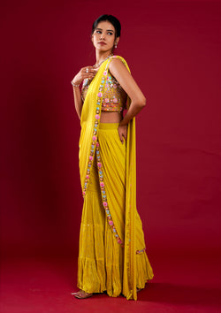 A stunning yellow georgette saree featuring exquisite hand work.