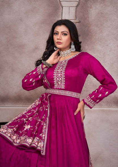 Stunning pink anarkali suit featuring intricate embroidery, a must-have for celebrations.