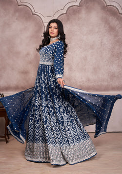 Blue embroidered anarkali suit with intricate patterns and elegant design, perfect for special occasions.